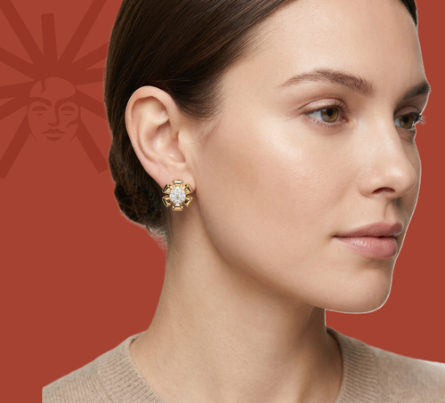 Yellow gold vermeil lab diamond stud earrings on model, round halo center