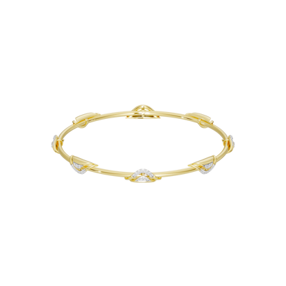 Yellow gold vermeil lab diamond bangle with wave twist centerpiece, isolated
