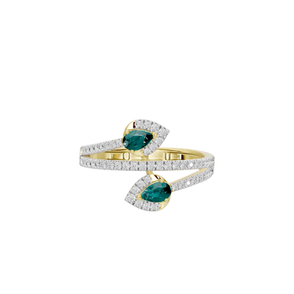 Yellow gold ring with emerald-green stones and diamond pavé accents on two bands