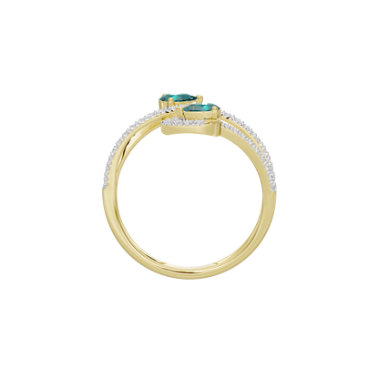 Yellow gold ring with diamond pavé band and emerald-green center stone