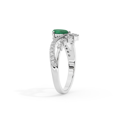 Sterling silver ring with green emerald center stone and diamond halo