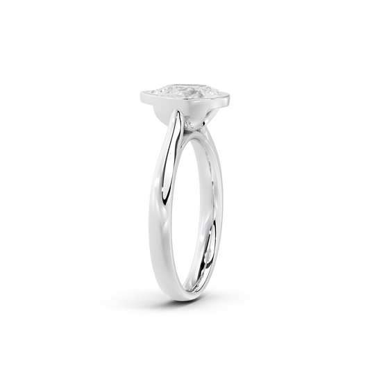 Top view of 925 sterling silver pear-cut lab diamond bezel solitaire ring