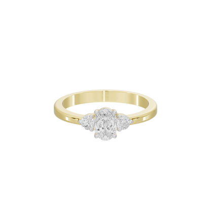 Yellow gold vermeil diamond ring with oval center diamond and three-stone look