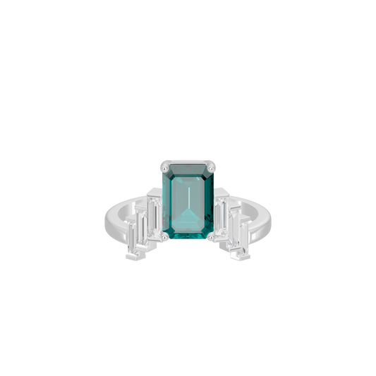 Lab diamond ring with teal emerald-cut center stone and baguette side accents.
