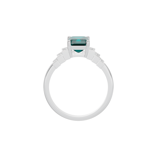 Lab diamond ring top view with emerald-cut teal gemstone in prong setting.