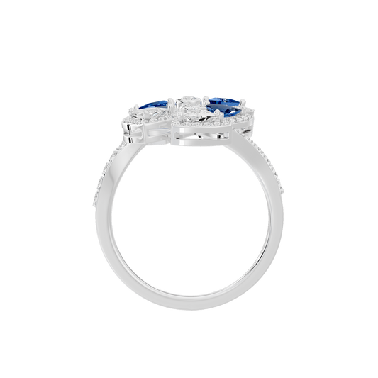 Sterling silver lab diamond ring with blue stones on top and prong-set band