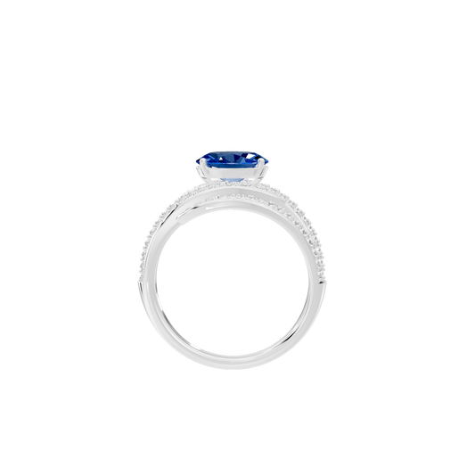 Sterling silver lab diamond ring top view with oval blue center stone and pavé detail