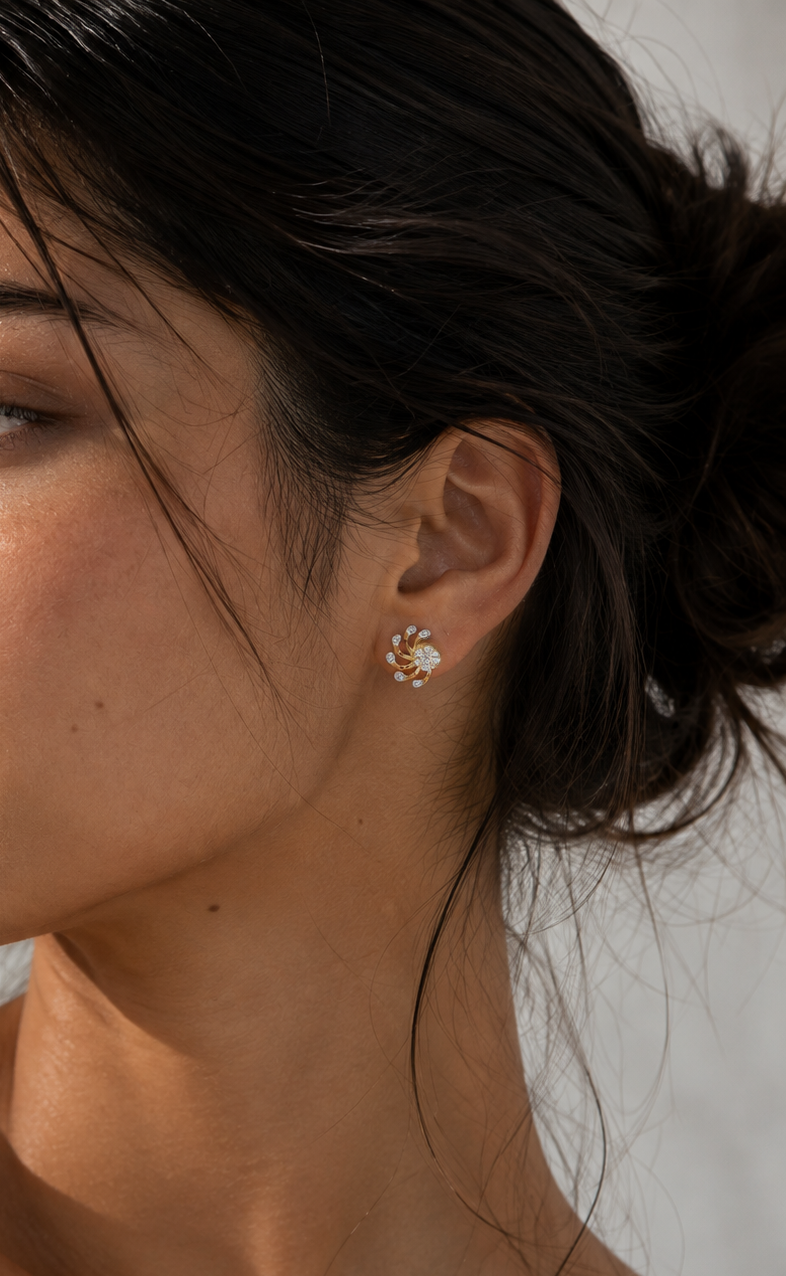 Woman wearing yellow gold vermeil lab diamond flower stud earrings