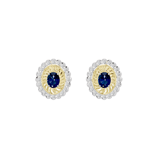 Pair of oval lab diamond stud earrings with blue center stone and gold vermeil halo