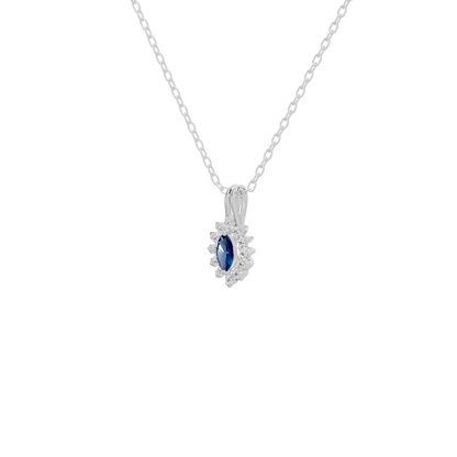Sterling silver pendant with oval blue lab diamond and surrounding pavé detail