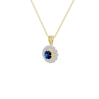 Gold chain diamond pendant with blue center stone in round diamond halo