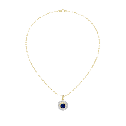 Gold chain with small blue round diamond pendant in a diamond halo