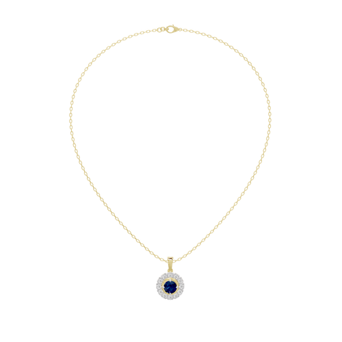Gold chain with small blue round diamond pendant in a diamond halo