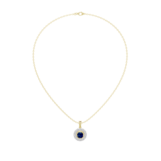 Gold chain with small blue round diamond pendant in a diamond halo