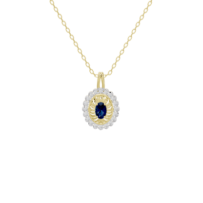 Lab diamond pendant with oval blue center stone and white halo on yellow gold chain