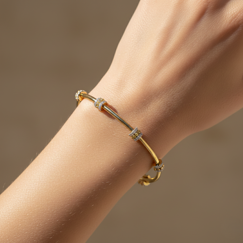 Yellow gold vermeil lab diamond bangle on wrist with pavé diamond details
