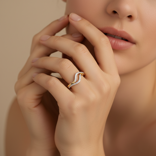 Yellow gold vermeil wave-style lab diamond ring on finger