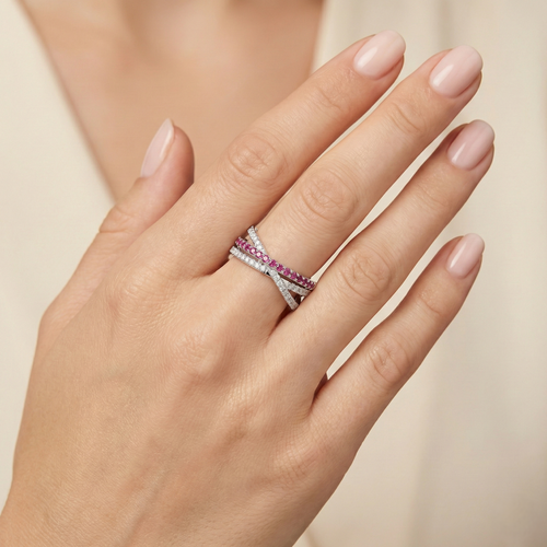Ruby and diamond-look parallel band ring on hand, sterling silver with pink stones