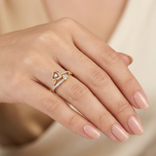 Yellow gold vermeil heart ring with sparkling stones on finger