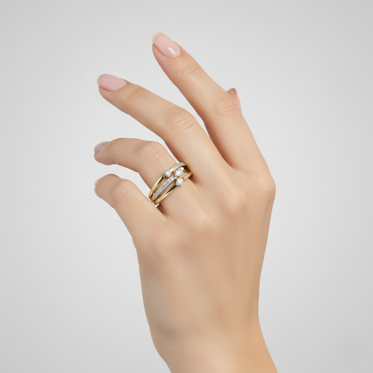 Yellow gold vermeil lab diamond ring with three round stones on a hand