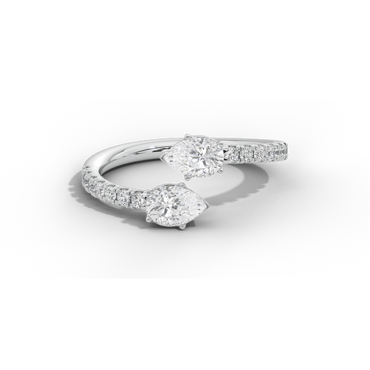 Sterling silver lab diamond ring with three round pavé stones on a curved band