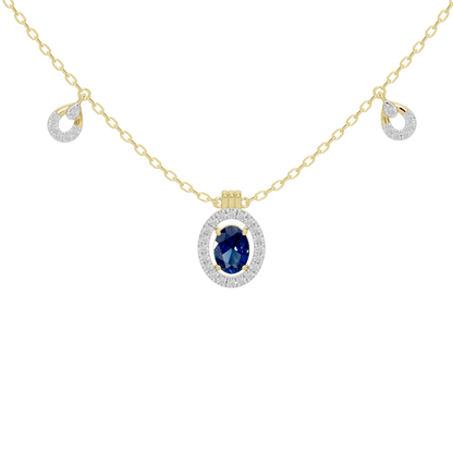 Yellow gold vermeil necklace with blue oval halo pendant and dangling round accents
