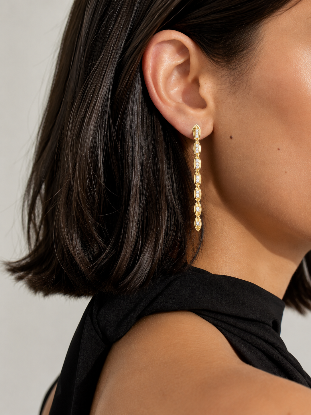 Yellow gold vermeil lab diamond drop earrings with an oval stone row