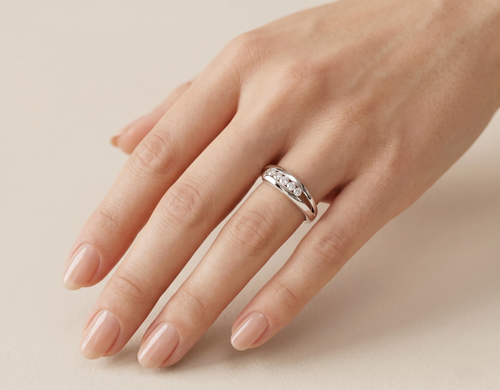 925 sterling silver lab diamond ring on hand, featuring a row of round stones