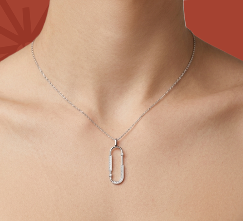 Silver lab diamond U pendant necklace worn at the collarbone
